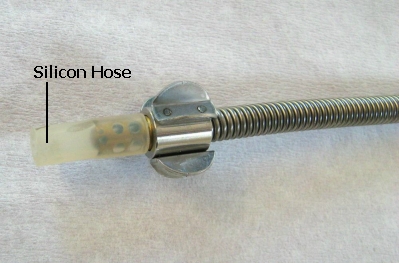 The silicon hose blocks the sample tube intake
